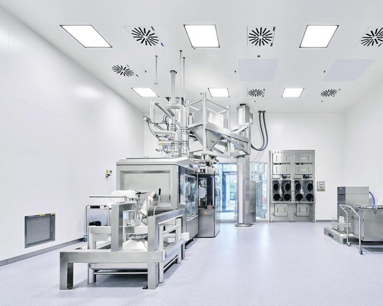Cleanroom processing suite with stainless-steel process equipment, flush wall panels and ceiling air diffusers
